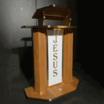 Púlpito de Madeira Arão, Púlpito de madeira com LED, Púlpito com LED para igrejas, Púlpito moderno de madeira, Púlpito para altar com LED RGB, Púlpito com logo personalizado grátis, Púlpito para igrejas evangélicas, Púlpito de madeira com iluminação, Púlpito para altar com LED decorativo, Púlpito evangélico com logo grátis Púlpito moderno para igrejas evangélicas, Púlpito de madeira com LED para igrejas evangélicas, Púlpito moderno com LED e logomarca personalizada, Púlpito para igreja com LED multicolor grátis, Comprar púlpito de madeira com LED RGB, Púlpito evangélico com logo adesivo personalizado, Púlpito decorativo de madeira para igrejas, Púlpito para altar com iluminação LED grátis, Melhores púlpitos de madeira modernos, Púlpito com LEDs coloridos para ministérios evangélicos, Púlpito para igrejas pequenas ou grandes com LED RGB, Onde comprar púlpito de madeira com LED grátis para igrejas, Púlpito com logomarca personalizada para altar evangélico, Púlpito moderno com iluminação LED RGB para decoração de igrejas, Púlpito de madeira com LED e logo Jesus grátis, Melhor púlpito decorativo para altar com luzes coloridas, Púlpito evangélico com logomarca em adesivo grátis, Púlpito com iluminação LED e base de madeira robusta, Ofertas de púlpitos personalizados com LED RGB, Púlpito para altar evangélico com logo adesiva e LED grátis, Púlpito para igrejas pequenas com LED RGB decorativo, Púlpito para igreja evangélica com LED RGB, Púlpito decorativo para pastores evangélicos, Púlpito de madeira moderno para cultos, Púlpito para altar com LEDs para igrejas evangélicas, Púlpito com iluminação cristã para altar de igreja, Melhor púlpito moderno para igrejas pentecostais, Púlpito decorativo para ministérios religiosos, Púlpito de madeira com iluminação para igrejas evangélicas, Púlpito robusto e decorativo para pastores, Púlpito para altar de pastores com LED RGB, Púlpito com personalização grátis para igrejas, Decoração para altar de pastores com púlpito de madeira, Púlpito para igrejas tradicionais com toque moderno, Púlpito LED RGB grátis para igrejas evangélicas, Púlpito com logomarca adesiva personalizada grátis, Púlpito de madeira com luzes coloridas LED, Púlpito com iluminação LED RGB decorativo para altar, Púlpito de madeira moderno com LED para pastores, Púlpito decorativo com logo adesivo Jesus incluso, Púlpito estilo clássico com LED RGB grátis, Púlpito de madeira iluminado para cultos evangélicos, Púlpito decorativo com logo cristã personalizável grátis, Púlpito com luzes RGB e madeira resistente para igrejas, Púlpito com LED para igrejas em São Paulo, Comprar púlpito de madeira em Minas Gerais, Púlpito evangélico com logo grátis em Goiás, Púlpito moderno com luzes em Brasília, Púlpito personalizado para altar no Rio de Janeiro, Púlpito decorativo para ministérios evangélicos na Bahia, Púlpito LED grátis para igrejas no Paraná, Púlpito de Madeira com LED RGB e Logo Grátis – Modernize sua igreja hoje, Personalize o altar da sua igreja com púlpitos modernos. Confira, Púlpito com LED e logomarca adesiva para igrejas evangélicas. Frete rápido, Decore com estilo: Púlpito de madeira com LEDs coloridos. Compre agora,