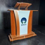 Púlpito de Madeira Abraão, Púlpito de madeira com LED, Púlpito com LED para igrejas, Púlpito moderno de madeira, Púlpito para altar com LED RGB, Púlpito com logo personalizado grátis, Púlpito para igrejas evangélicas, Púlpito de madeira com iluminação, Púlpito para altar com LED decorativo, Púlpito evangélico com logo grátis, Púlpito moderno para igrejas evangélicas, Púlpito de madeira com LED, Púlpito com LED para igrejas, Púlpito moderno de madeira, Púlpito para altar com LED RGB, Púlpito com logo personalizado grátis, Púlpito para igrejas evangélicas, Púlpito de madeira com iluminação, Púlpito para altar com LED decorativo, Púlpito evangélico com logo grátis, Púlpito moderno para igrejas evangélicas, Púlpito de madeira com LED, Púlpito com LED para igrejas, Púlpito moderno de madeira, Púlpito para altar com LED RGB, Púlpito com logo personalizado grátis, Púlpito para igrejas evangélicas, Púlpito de madeira com iluminação, Púlpito para altar com LED decorativo, Púlpito evangélico com logo grátis, Púlpito moderno para igrejas evangélicas, Púlpito para igreja evangélica com LED RGB, Púlpito decorativo para pastores evangélicos, Púlpito de madeira moderno para cultos, Púlpito para altar com LEDs para igrejas evangélicas, Púlpito com iluminação cristã para altar de igreja, Melhor púlpito moderno para igrejas pentecostais, Púlpito decorativo para ministérios religiosos, Púlpito de madeira com iluminação para igrejas evangélicas, Púlpito robusto e decorativo para pastores, Púlpito para altar de pastores com LED RGB, Púlpito com personalização grátis para igrejas, Decoração para altar de pastores com púlpito de madeira, Púlpito para igrejas tradicionais com toque moderno, Púlpito LED RGB grátis para igrejas evangélicas, Púlpito com logomarca adesiva personalizada grátis, Púlpito de madeira com luzes coloridas LED, Púlpito com iluminação LED RGB decorativo para altar, Púlpito de madeira moderno com LED para pastores, Púlpito decorativo com logo adesivo Jesus incluso, Púlpito estilo clássico com LED RGB grátis, Púlpito de madeira iluminado para cultos evangélicos, Púlpito decorativo com logo cristã personalizável grátis, Púlpito com luzes RGB e madeira resistente para igrejas, Púlpito com LED para igrejas em São Paulo, Comprar púlpito de madeira em Minas Gerais, Púlpito evangélico com logo grátis em Goiás, Púlpito moderno com luzes em Brasília, Púlpito personalizado para altar no Rio de Janeiro, Púlpito decorativo para ministérios evangélicos na Bahia, Púlpito LED grátis para igrejas no Paraná, Púlpito de Madeira com LED RGB e Logo Grátis Modernize sua igreja hoje, Personalize o altar da sua igreja com púlpitos modernos. Confira, Púlpito com LED e logomarca adesiva para igrejas evangélicas. Frete rápido, Decore com estilo: Púlpito de madeira com LEDs coloridos. Compre agora